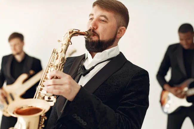 A saxophone player in a rock band